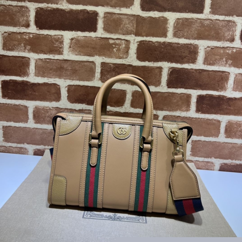 G*u*i shopping bags